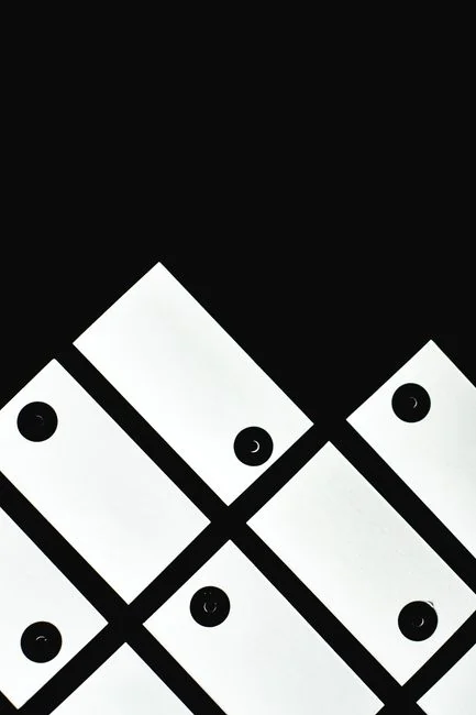 A close-up view of the Google Material design sticker sheet on a MacBook.